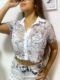 Blusa de malla estampada